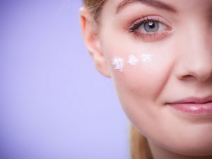 Skincare. Face of young woman girl taking care of dry skin.